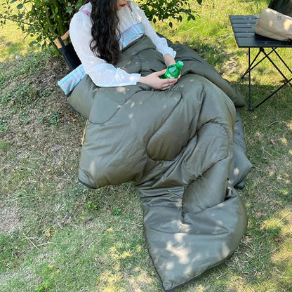 femme assise sac couchage grand froid