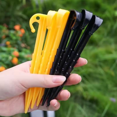 Piquet de tente jaune noir